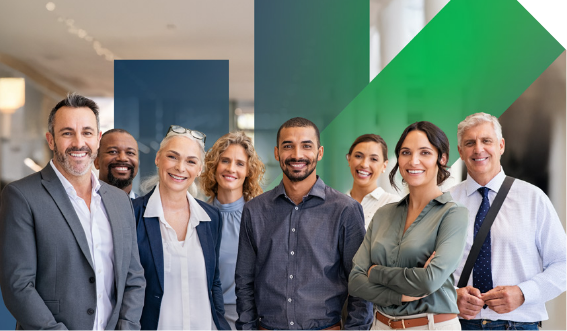 A diverse group of eight professionally dressed adults stand together indoors, smiling at the camera, with abstract blue and green shapes in the background.